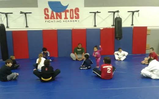 a group of people sitting on the floor