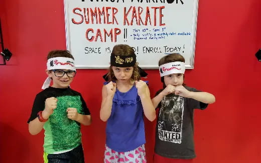 a group of children wearing clothing