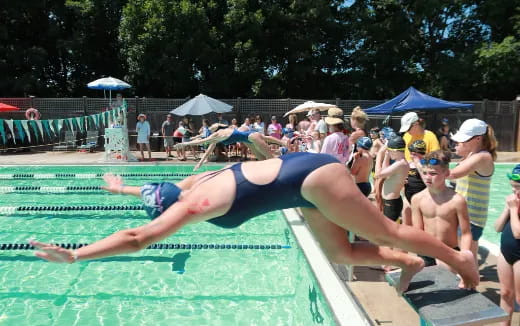 a group of people in a pool