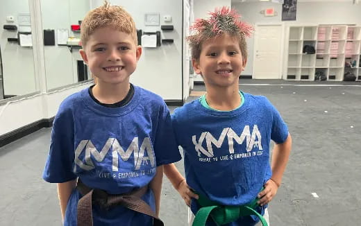 two boys standing together