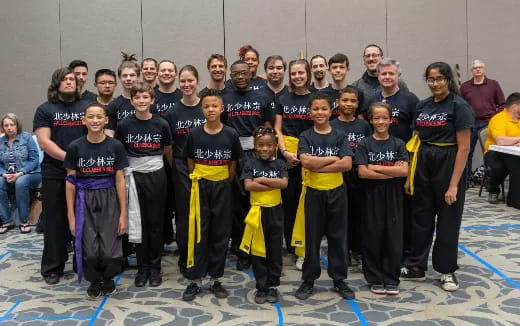 a group of people posing for a photo