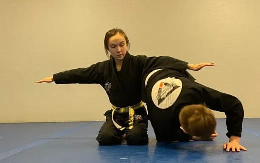 a person in black karate uniform