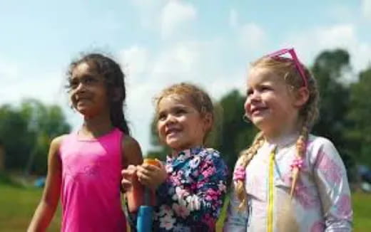 a group of girls smiling