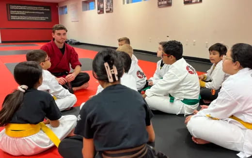 a group of people sitting in a circle