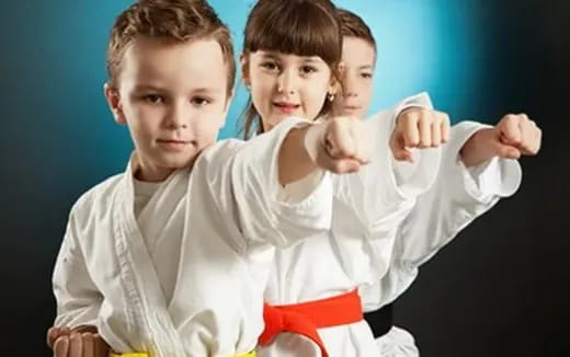 a group of boys posing for a picture