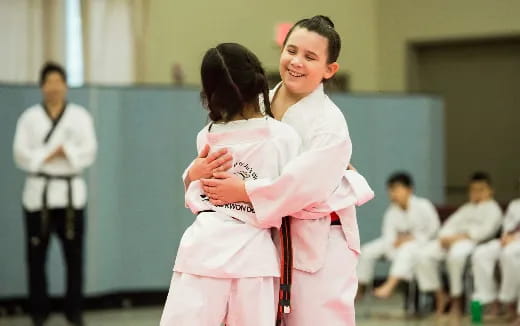 a woman holding a child