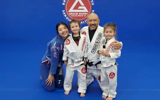 a group of people posing for a photo