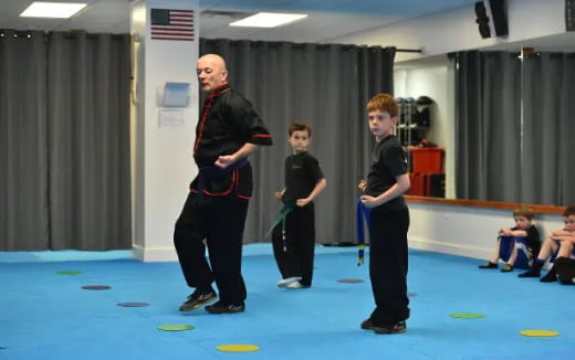 a person and two boys