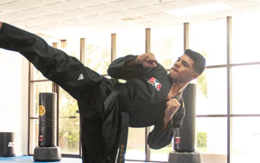 a person holding another man's hand