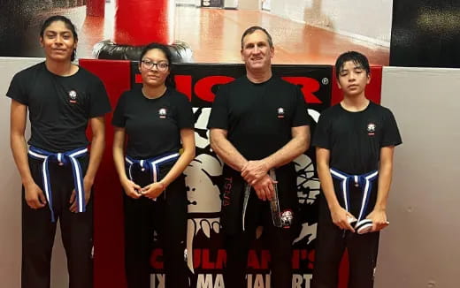 a group of people posing for a photo