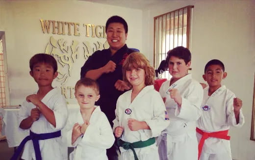 a group of people posing for a photo