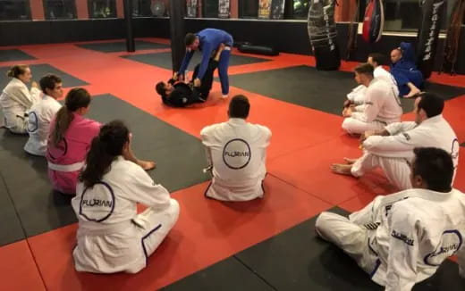 a group of people in a gym