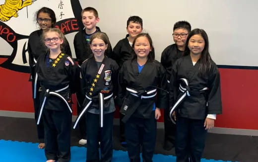 a group of people posing for a photo