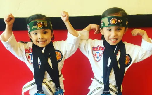 a group of kids wearing uniforms