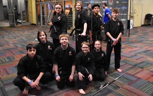 a group of people posing for a photo