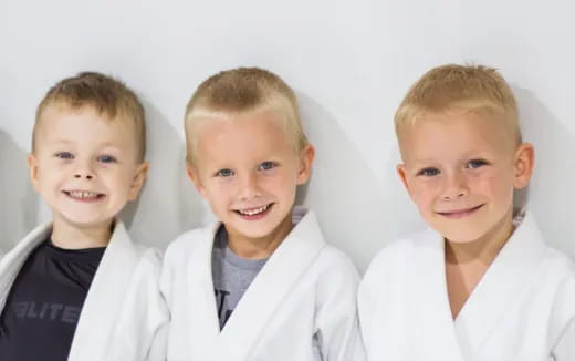 a group of boys smiling