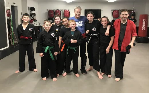 a group of people posing for a photo