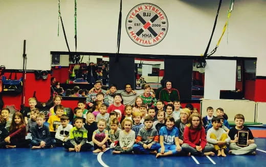 a group of people posing for a photo