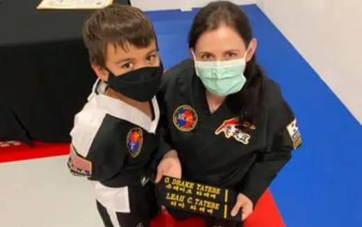 two boys wearing face masks