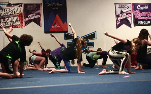 a group of people doing yoga