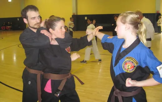 a group of people in a gym