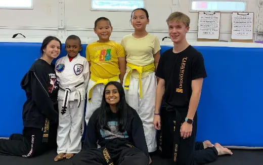 a group of people posing for a photo