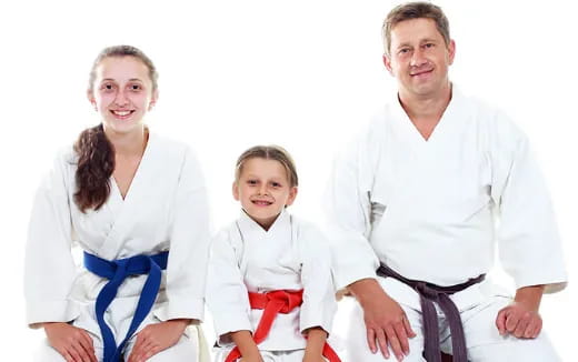 a man and woman with a child