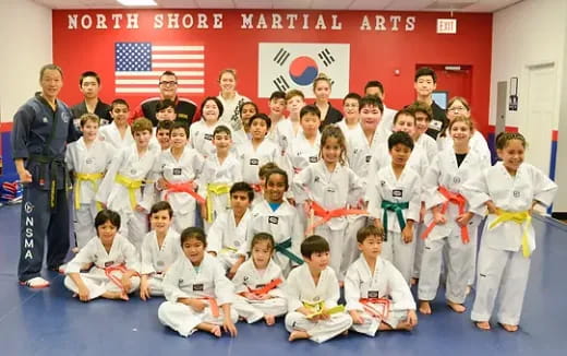 a group of people posing for a photo