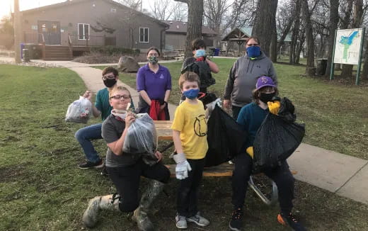 a group of people wearing masks