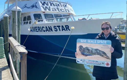 a person holding a fish