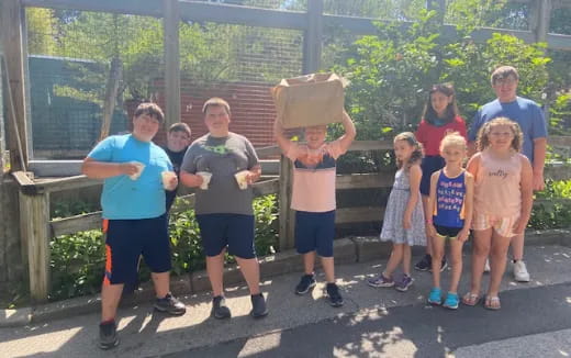 a group of people standing outside