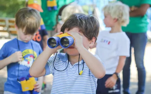 a group of kids wearing blue goggles