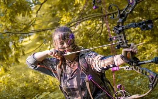 a girl playing a violin