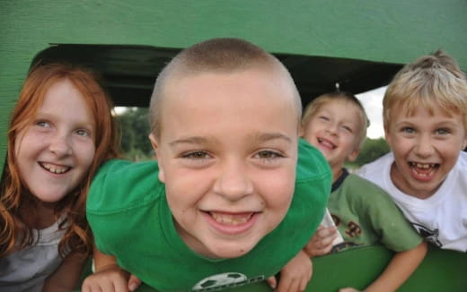 a group of children smiling