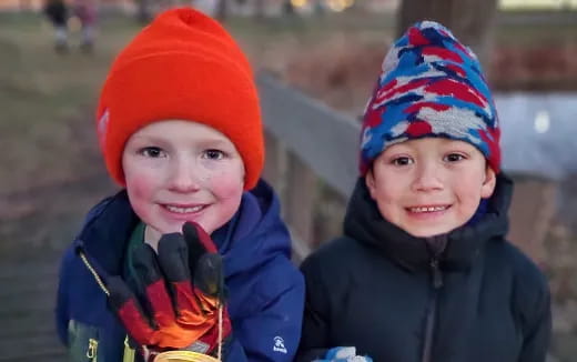 two children wearing hats