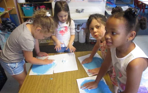 a group of children in a classroom
