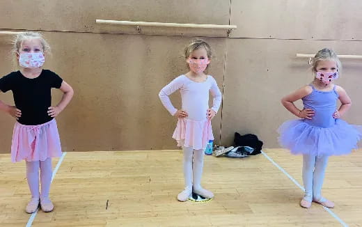 a group of girls wearing clothing