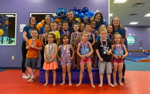 a group of children posing for a photo