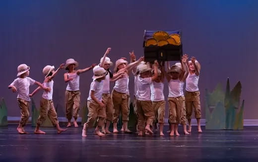 a group of children on a stage