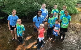 a group of people posing for a photo