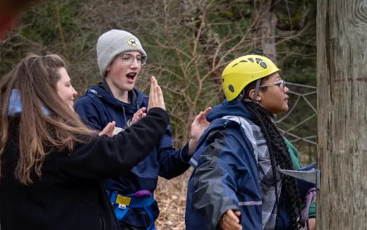 a group of people in the woods