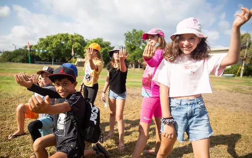 a group of people posing for a photo