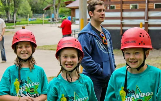a group of people wearing helmets