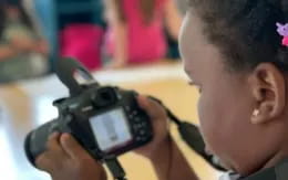 a man holding a camera