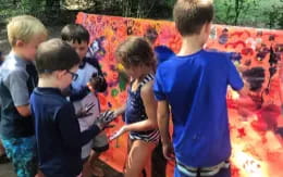 a group of children standing in a line