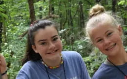 a person and a girl smiling