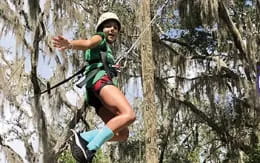 a man climbing a tree