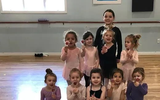 a group of children posing for a photo