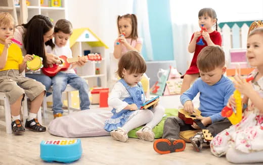 a group of children sitting on the floor