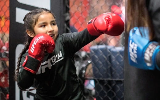 a person wearing boxing gloves